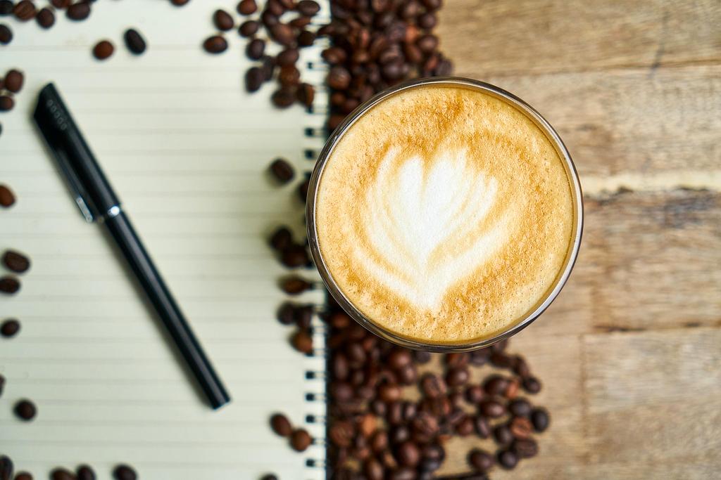 Professional coffee grinder with freshly ground beans